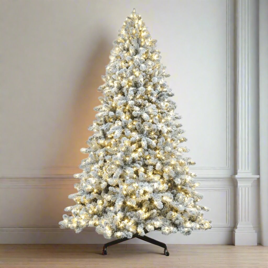 Joy By 9.5' Flocked Christmas tree with 1200 Warm White LED Lights - Joy By